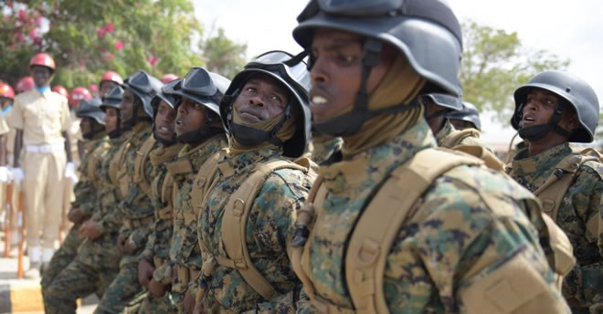 Somali National Army soldiers march during the 57th Anniversary of the Somali National Army held at the Ministry of defence in Mogadishu on April 12, 2017. Image: Ilyas Ahmed/AMISOM