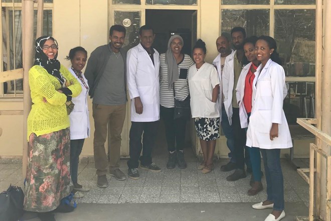 During medical school, Dr. Fartoon Siad, MD, (centre) explored the impact of malaria in pregnancy on maternal care in rural Ethiopia.