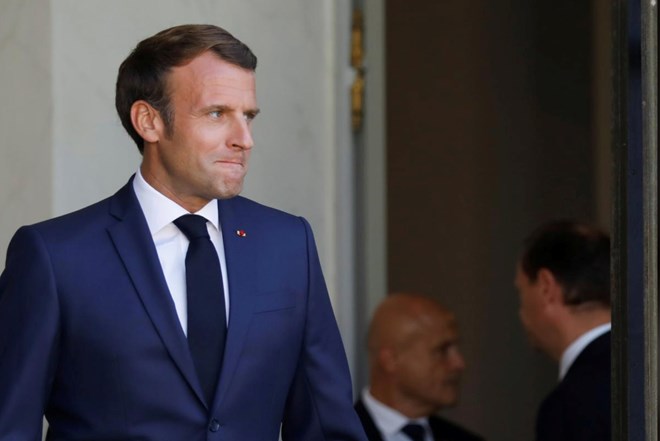 French President Emmanuel Macron waits for Tunisia's President Kais Saied before a meeting at the Elysee Palace in Paris, France, June 22, 2020. REUTERS/Charles Platiau