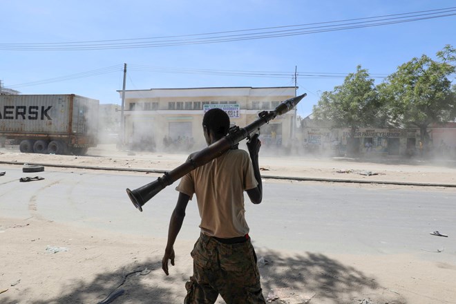 A supporter of the opposition in Mogadishu. Fighting on Sunday raised fears that Somalia’s political crisis could spill over into violence. Credit...Feisal Omar/Reuters