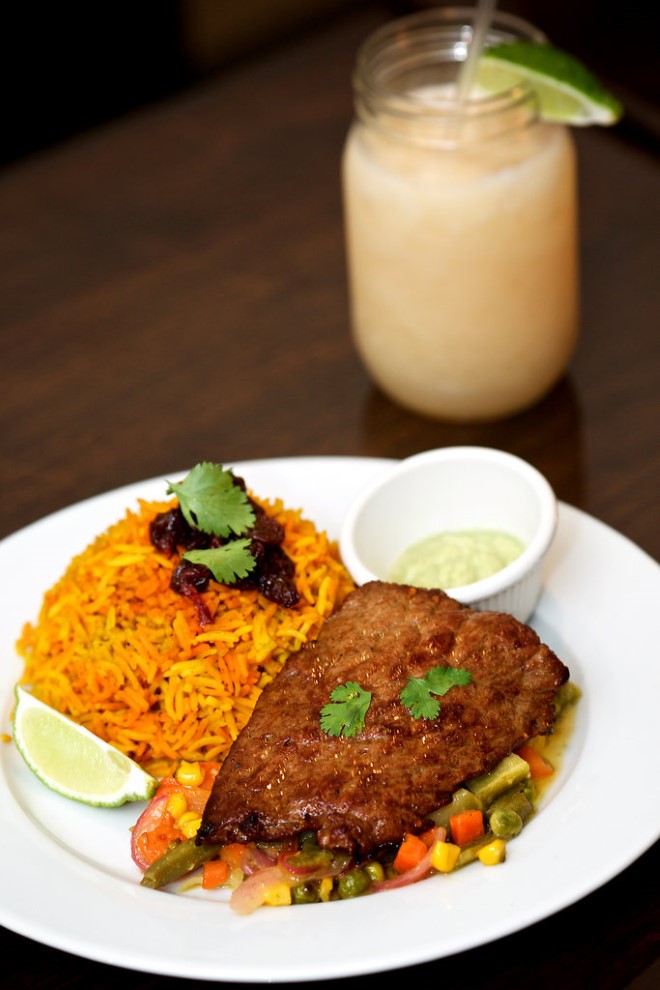 Flank steak cut thin, fried hard and wholly possessed by ginger and garlic.