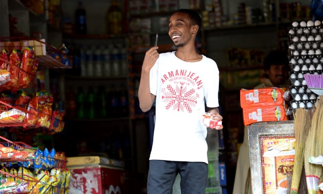 A young Somali man at a store in Islamabad | Taveer Shahzad, White Star