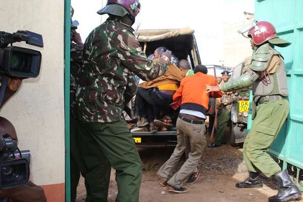 Police arrest some of the Ethiopian nationals found hiding in a house at Kamae, Kahawa West, in Nairobi on March 9, 2016. PHOTO | WILLIAM OERI | NATION MEDIA GROUP