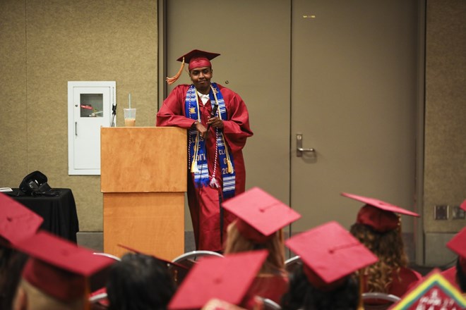 Mohamed Hassan spontaneously chose to speak in front of in front of all his graduating classmates as they waited to process in the graduation ceremony at the Minneapolis Convention Center in Minneapolis, Minn., on June 8, 2017. He spoke about how much he had grown up in the last year and reminded them they are one of the last students born in the 90's to be graduating from Roosevelt. Renee Jones Schneider