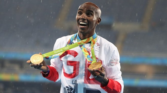 Farah celebrates his two gold medals in China.
