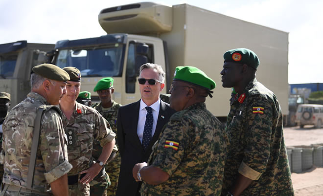 David Concar, the UK Ambassador to Somalia hands over vehicles donated by the UK Government to Lt. Gen. Jim Beesigye Owoyesigire, the African Union Mission in Somalia (AMISOM) Force Commander during a ceremony held in Mogadishu on June 30, 2018. AMISOM Photo / Ilyas Ahmed