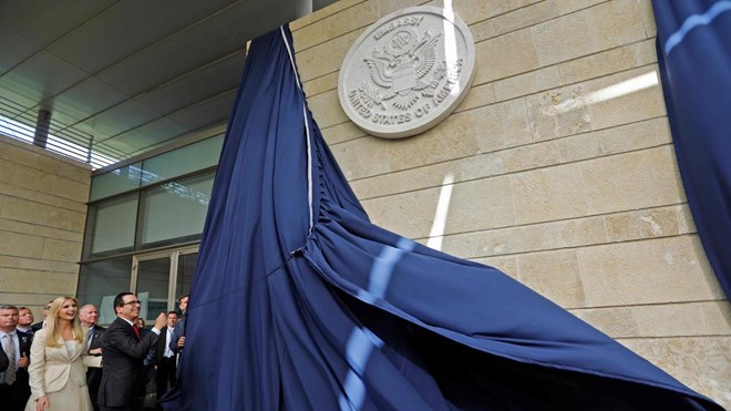 Menahem Kahana / AFP/Getty Images - US Treasury Secretary Steve Mnuchin and Senior Advisor to the President Ivanka Trump unveil an inauguration plaque during the opening of the US embassy in Jerusalem on May 14, 2018. The United States moved its embassy in Israel to Jerusalem after months of global outcry, Palestinian anger and exuberant praise from Israelis over President Donald Trump's decision tossing aside decades of precedent.